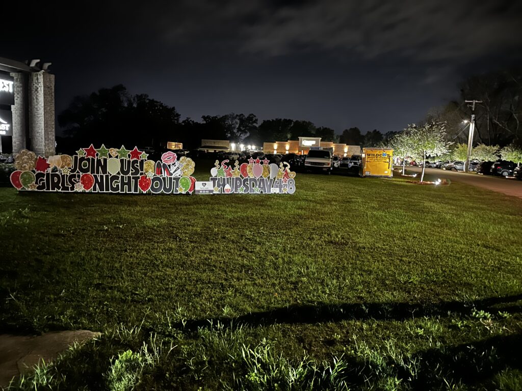 yard sign for holiday girls' night out in Daphne, AL