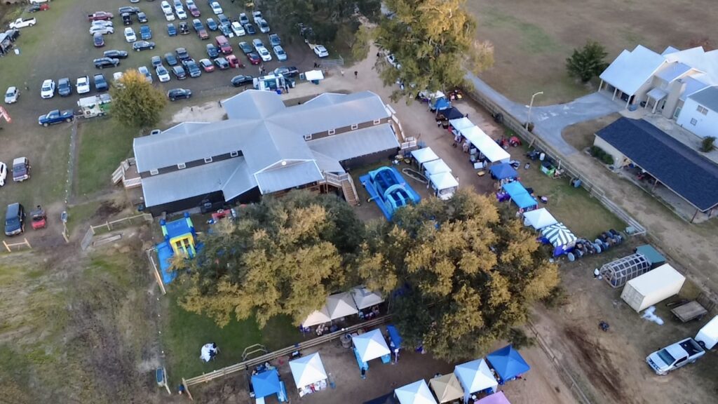 drone image of event at Jordan Beech Farms at Holiday Market & Family Day on 12/20/25